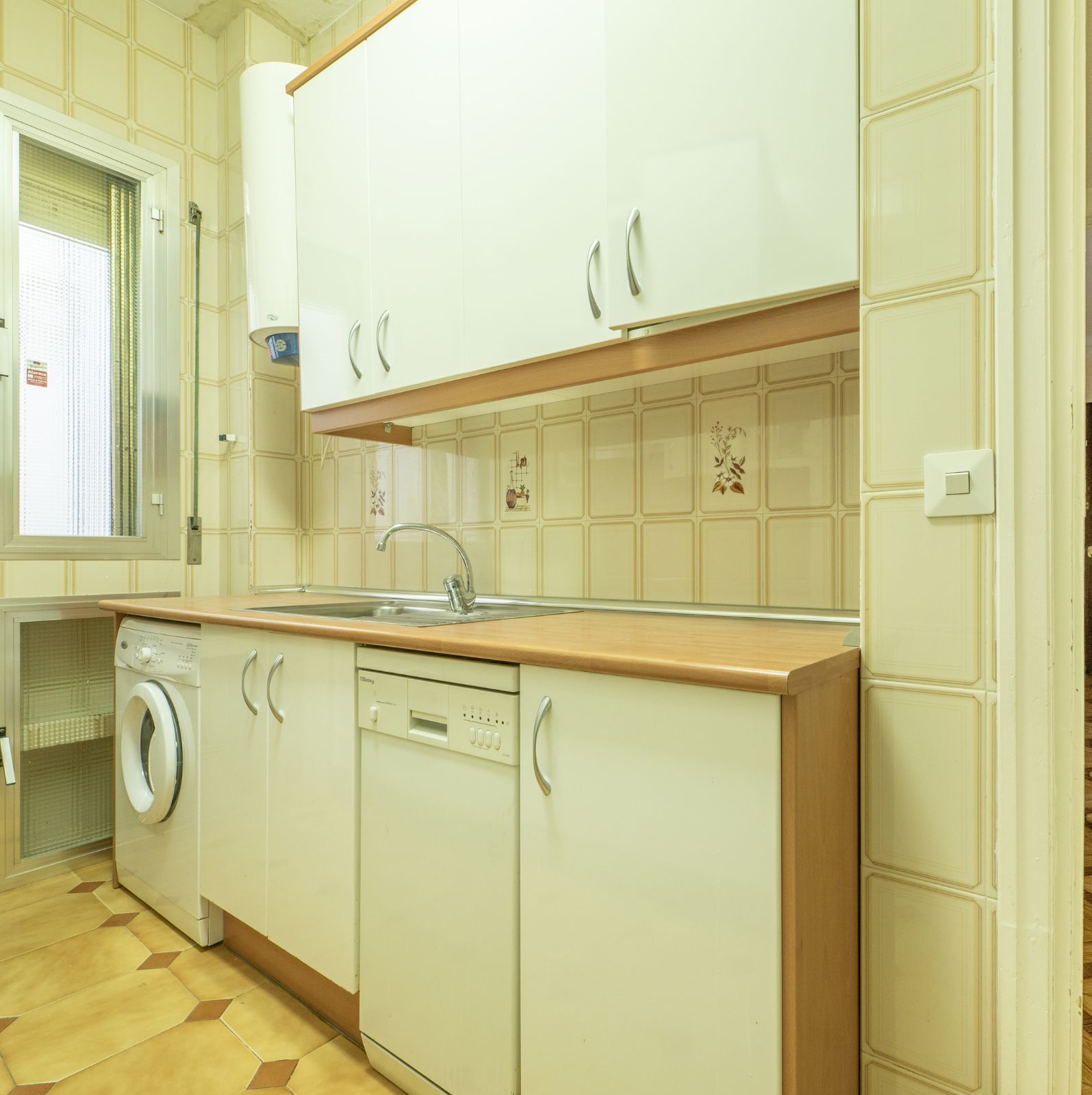 Kitchen cabinet painting project photo in 4424 Troost Ave, Kansas City