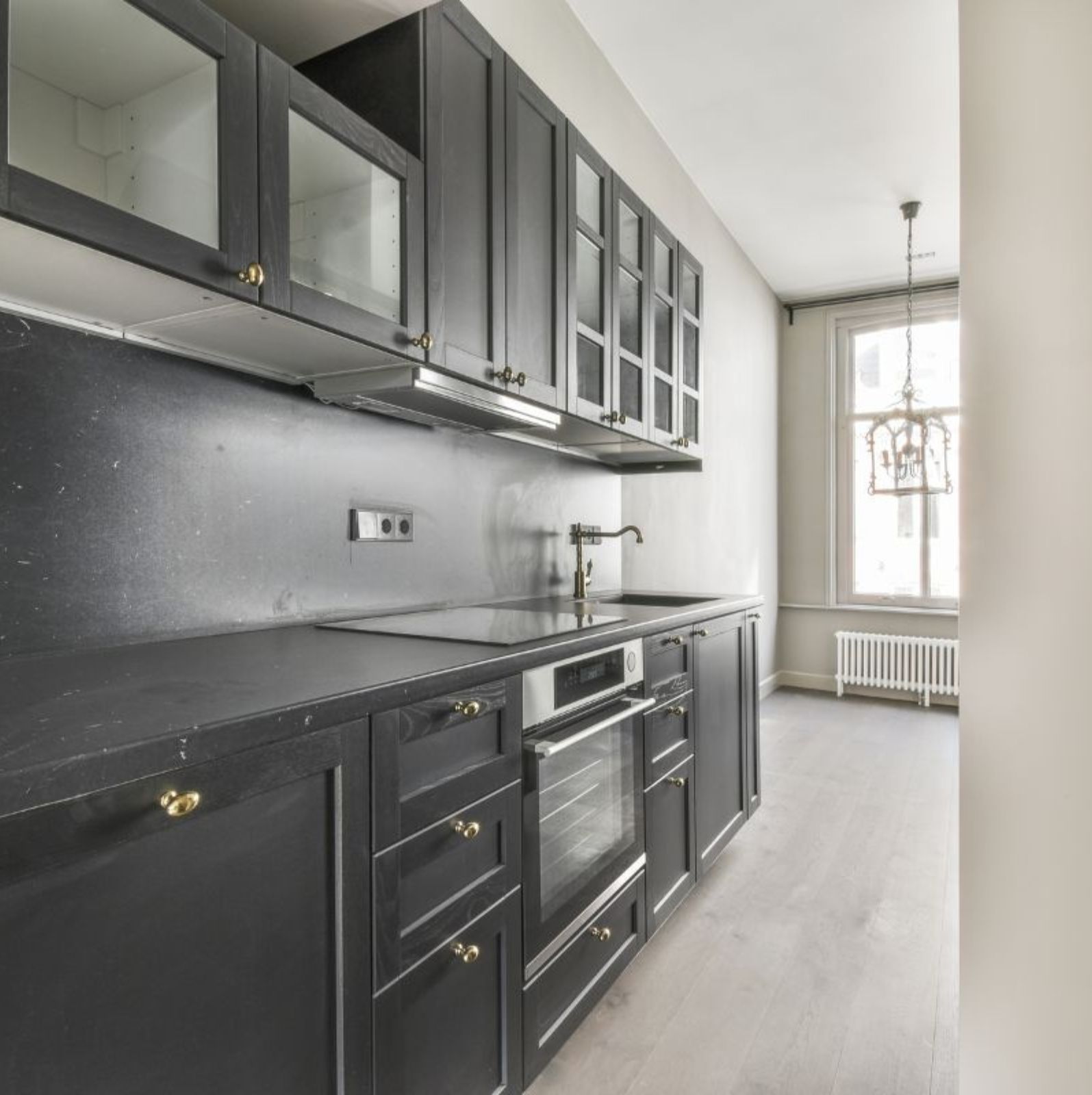 Kitchen cabinet painting project photo in 8800 Lexington Ave, Independence